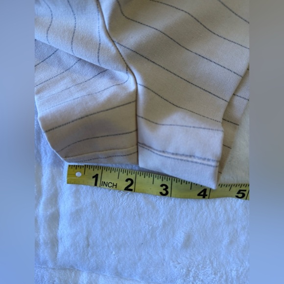 Zara Pleated Skort features a high waist, wrap front, side buckle, pleat details - Picture 11 of 16